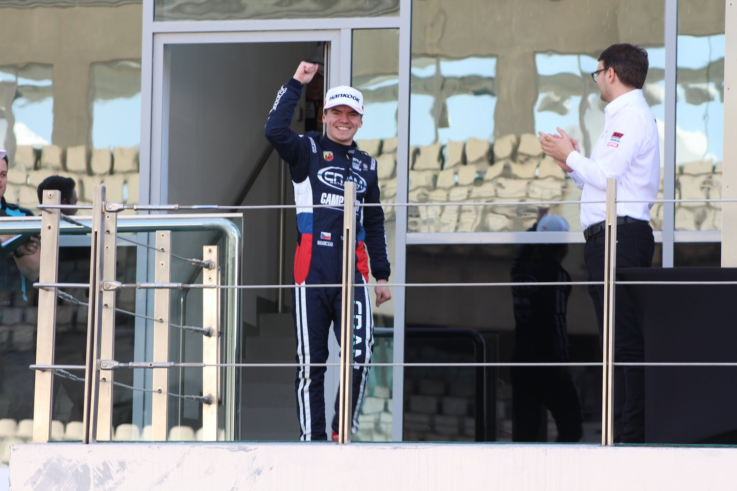 Tom Beckhäuser celebrating on the podium terrace